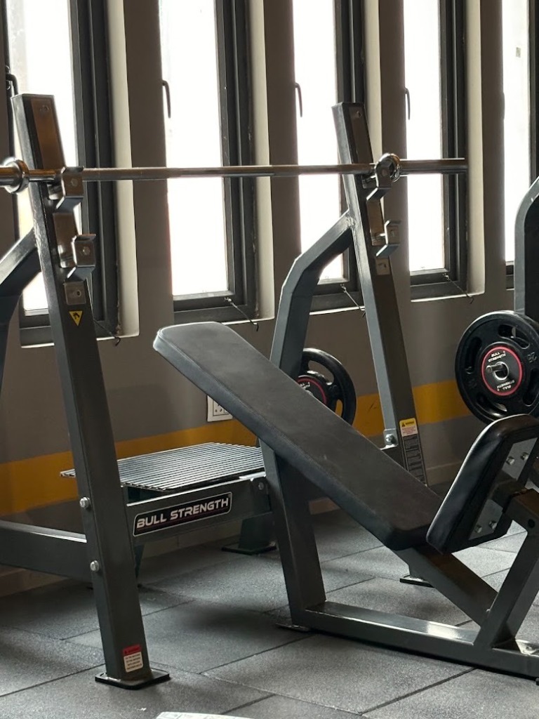 Incline barbell bench press station at Desh Gym